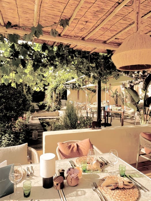 Dining terrace at Toile Blanche — Le Restaurant and La Guinguette